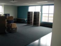 Bookcases and boxes of teachers&#8217; materials have been moved to finished classrooms at the elementary school.