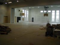 Backboards have been installed in the gymnasium and much of the construction materials have been removed.