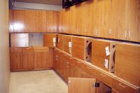 Cabinets are installed and extra cabinetry is being stored in this storage area in one of the science classrooms.