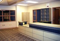 The circulation desk for the lower level of the high school media center has been installed.