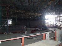 Next to the main office is the cafetorium where scaffolding fills the room.